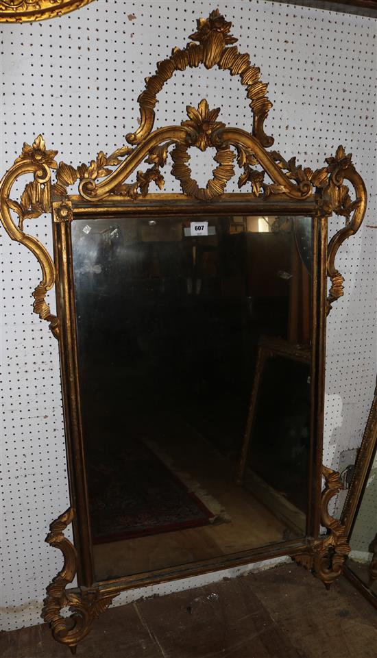 A 19th century Continental giltwood wall mirror, W.2ft 11in. H.5ft